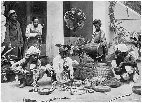 Antique photograph of the British Empire: Snake charmers in India