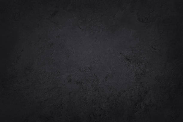 istock Dark grey black slate texture in natural pattern with high resolution for background and design art work. Black stone wall. 1204422543