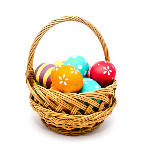 istock Perfect colorful handmade painted easter eggs in the basket isolated 1204423610