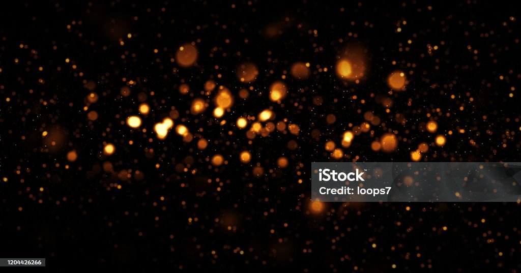 Glittery Defocused Lights Background Defocused Golden Lights over Dark Background Defocused Stock Photo