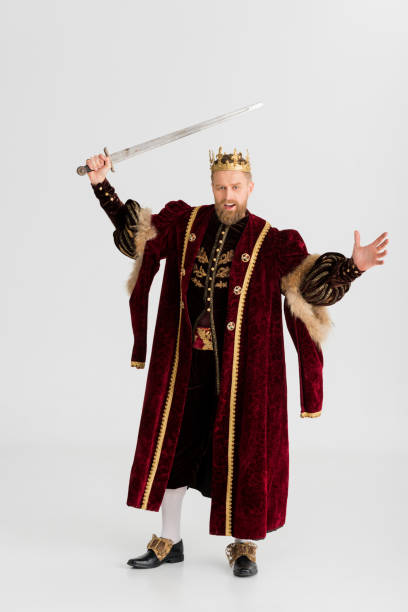 istock angry king with crown holding sword isolated on grey 1204426888