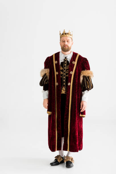 istock handsome king with crown looking at camera isolated on grey 1204426929