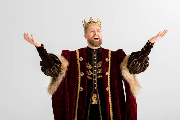 istock handsome king with crown screaming isolated on grey 1204426998