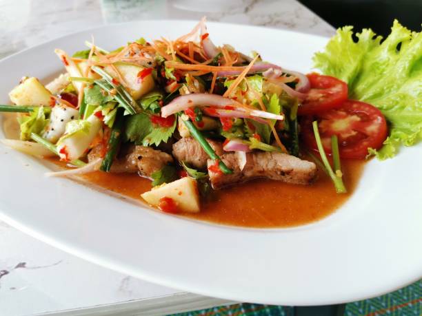 istock Pork Salad with a Fruit 1204427116