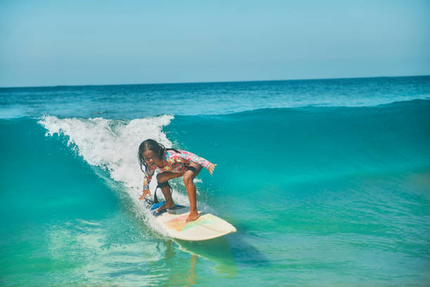 Fearless little brazilian girl surfing like a pro