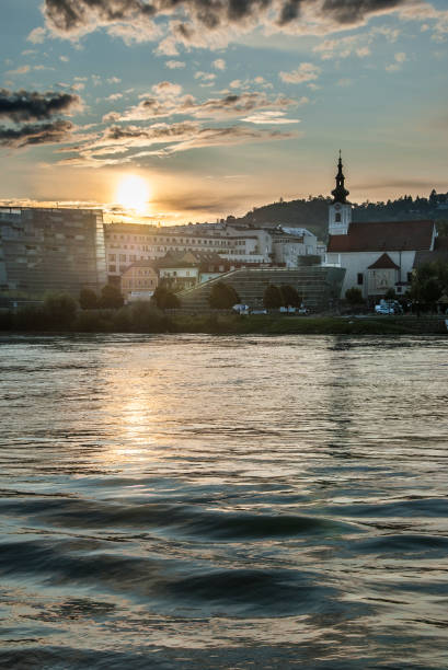 istock Sunset over the Danube (Donau) in Linz in Upper Austria 1204430456