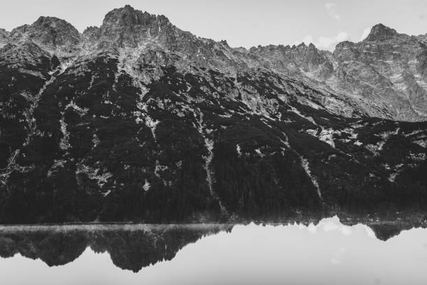 istock Lake in mountains. Black and white photo. 1204431066