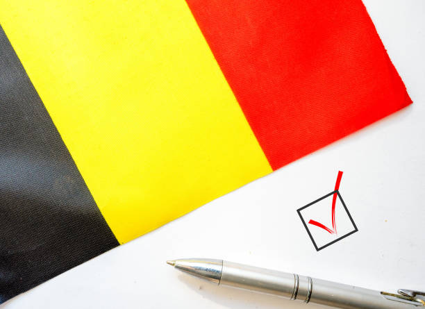 istock Flag of Belgium and check mark 1204431649