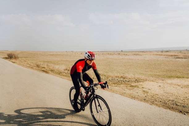 istock Senior cyclist during the triathlon training 1204433392