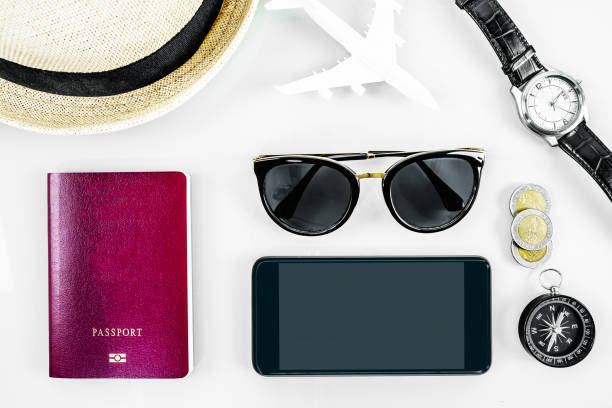 istock Traveling concept, smartphone, passport on white 1204434073