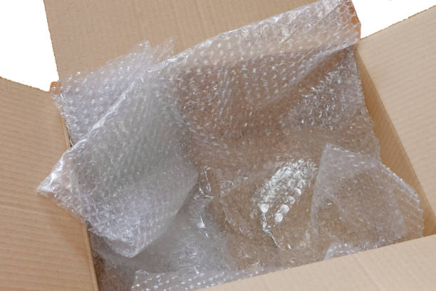 istock Brown cardboard box with. bubble pack as transport protection. 1204434182