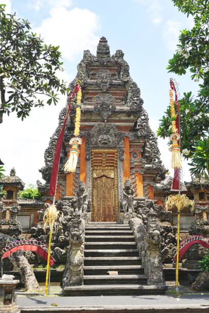 istock Beautiful ancient temple with blue sky overhead in Bali Indonesia 1204435054