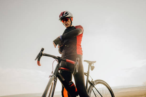 istock Cyclist checking the race time 1204436605