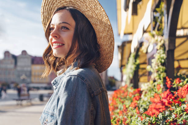 istock Happy attractive girl in a hat in summer 1204436807