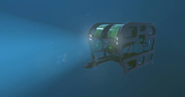 Underwater ROV A deep sea ROV - remote operated vehicle, with it's lights penetrating the darkness of the bottom of the ocean submarine photos stock pictures, royalty-free photos & images