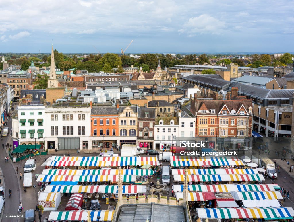 Market Square in Cambridge, England A high angle view over Market Square in Cambridge, with a large number of stalls under shelters, surrounded by shopping streets. UK Stock Photo