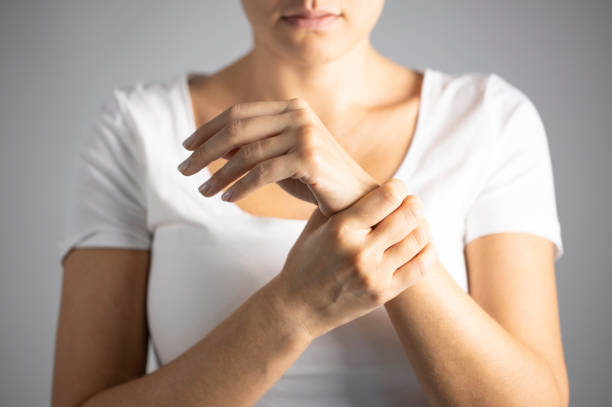 istock Young woman with wrist pain 1204444267