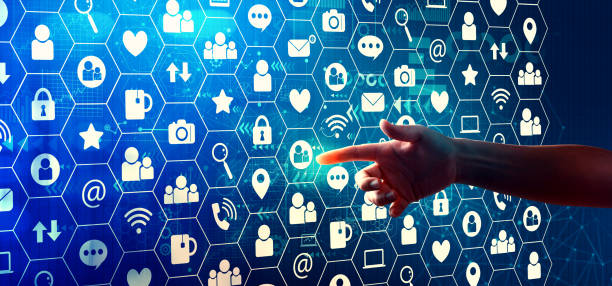 istock Social media theme with hand pressing a button 1204447083