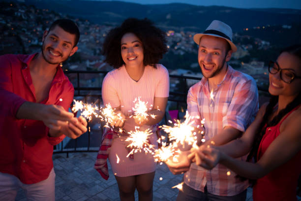 istock Friends celebrating with friends 1204449159