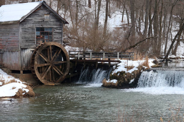 istock Rural landscape with old abandoned watermill in woods. 1204452220
