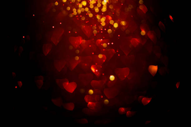 istock Background with red bokeh in the shape of a heart. 1204455840