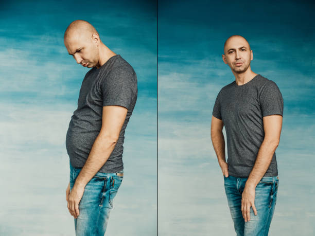 Tall bald man in a gray t-shirt before and after slimming therapy on a blue background Tall bald man in a gray t-shirt before and after slimming therapy on a blue before and after weight loss man stock pictures, royalty-free photos & images