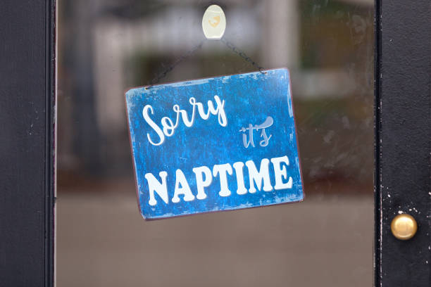 istock Sorry, it's naptime - Closed sign 1204457131
