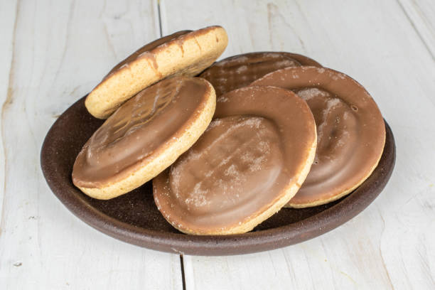 istock Chocolate biscuit on grey wood 1204457223