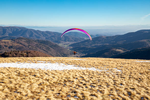 Paraglider at Belchen in Alsace starting