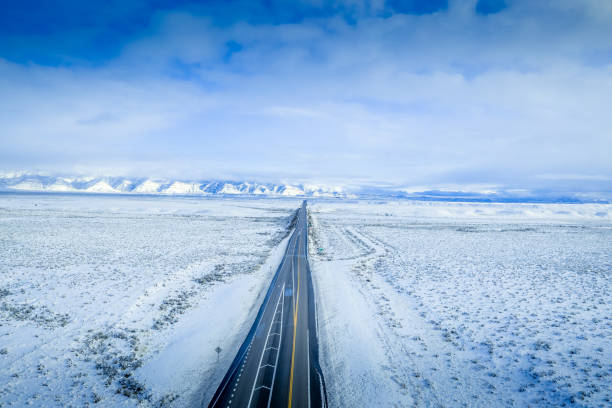 Aerial view winter wonderland scenic I-70 highway in Utah Aerial view winter wonderland scenic I-70 highway in Utah la sal mountains stock pictures, royalty-free photos & images