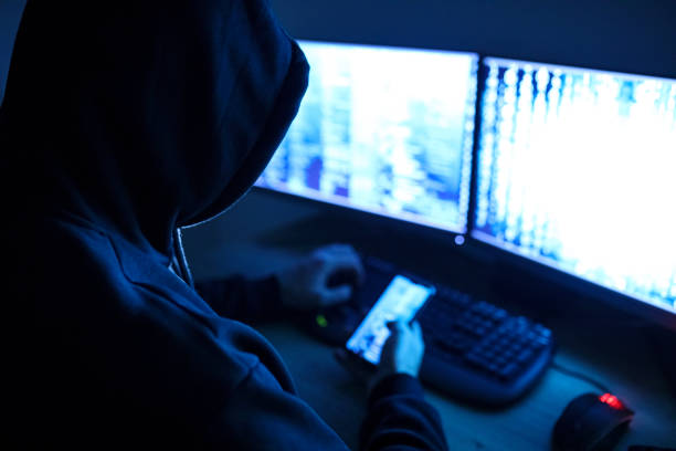 Hacker attacking internet Hacker attacking internet scam stock pictures, royalty-free photos & images