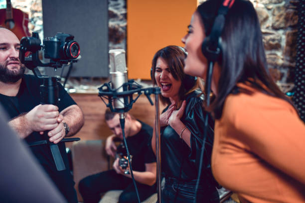istock Male Recording Band's New Video In Studio 1204461096