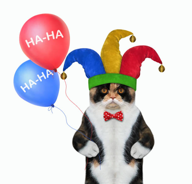 istock Cat clown with two balloons 1204461786