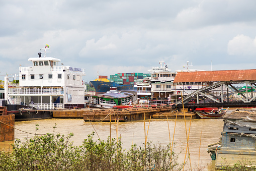 Passing containership on the Yangon river near Yangon, Myanmar
