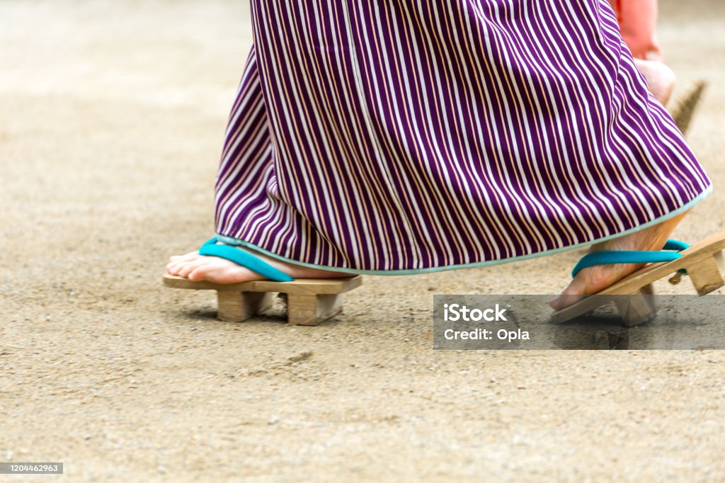Feet of Japanese woman in traditional dress Geta Sandal Stock Photo