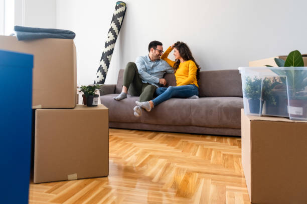 istock Couple relaxing on the sofa 1204465078