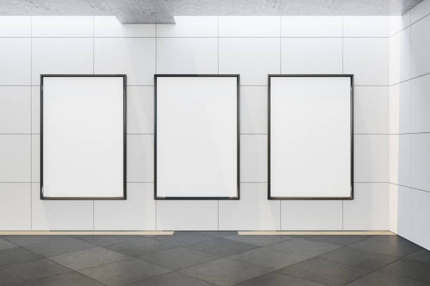 istock Contemporary concrete gallery interior with three empty banner. 1204466568