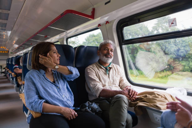 istock Indian tourist couple travelling in passenger train 1204467376