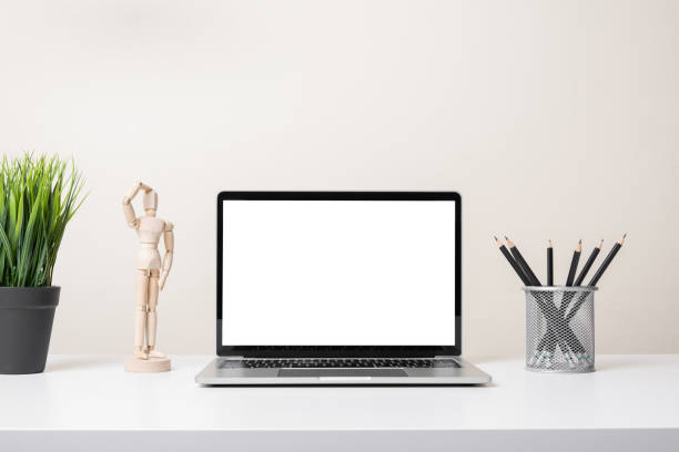 istock modern contemporary workspace with laptop computer, office stationery and supply on desk 1204468309