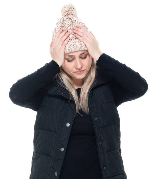 istock Caucasian young women sleeveless crouching wearing jacket 1204471123