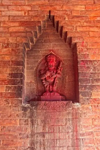 Colorful statue of a Hindu god in Bhaktapur, Nepal