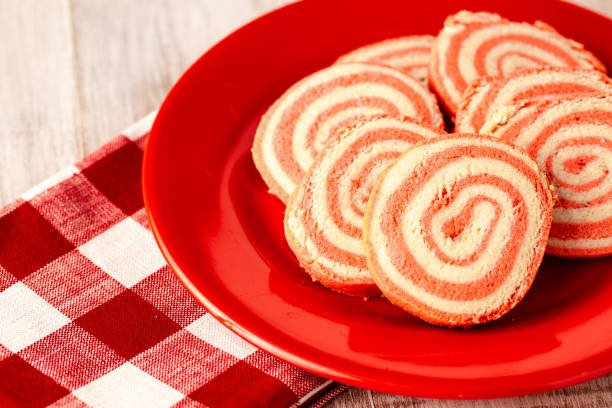 istock Valentine's Day Pinwheel Cookies on Red Plate 1204476176