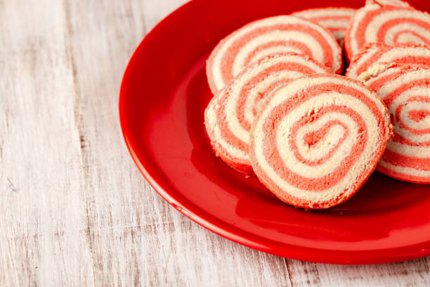 istock Valentine's Day Pinwheel Cookies on Red Plate 1204476184