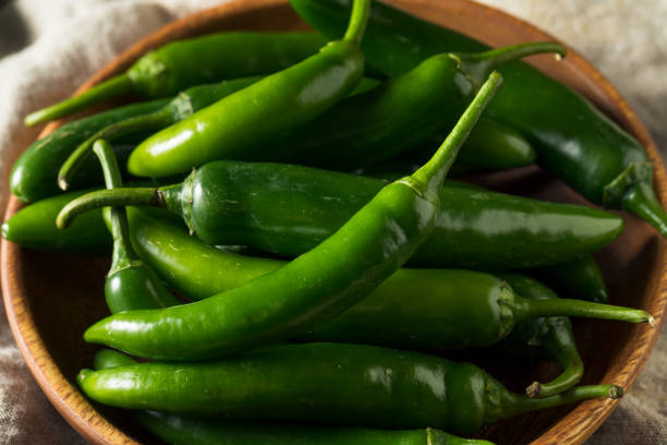 istock Raw Green Organic Serrano Peppers 1204477404