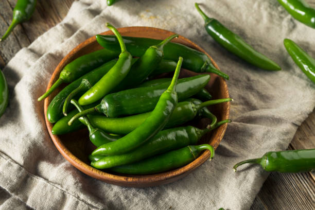 istock Raw Green Organic Serrano Peppers 1204478073