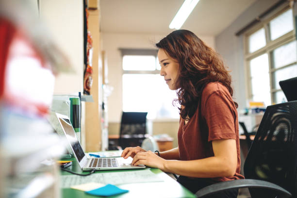 istock Chinese entrepreneur - freelancer working in office 1204480308