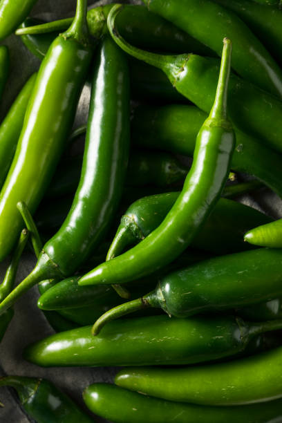istock Raw Green Organic Serrano Peppers 1204481405