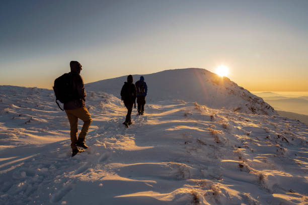 Small group of mountaineers hiking on the mountain.