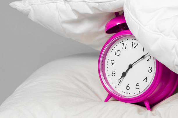 istock Alarm clock under the pillow - Don't want to wake up concept 1204483887