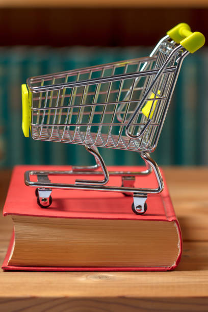 istock Books and a shopping cart 1204485431